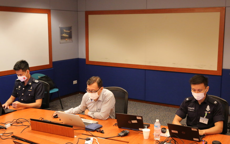 PCG's Station Inspector Ma Weiliang (left), MPA's Mr Peter Koh (centre) and PCG's Assistant Superintendent of Police Lee Hong Tat worked together to develop solutions to identified vulnerabilities during the exercise.