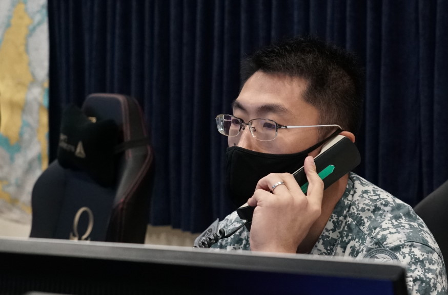 MSTF Watch Commander MAJ Ivan Kwah cueing and coordinating the SAF's interdiction operations against a hijacked vessel.