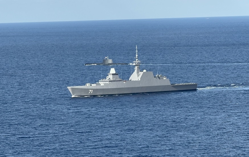 RSS Impeccable (background), RSS Tenacious (foreground) sailing along side as part of the manoeuvring exercise serial.