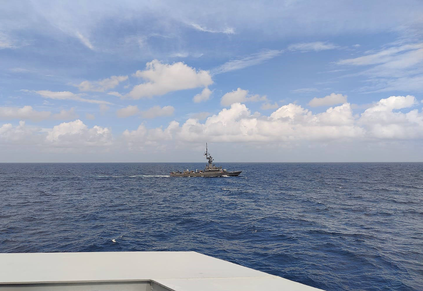 Keeping a close watch at his ship's disposition  from KDB Daruttaqwa during the manoeuvring exercise serial.