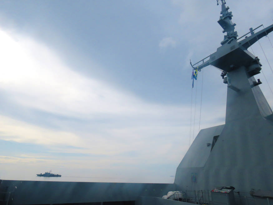 Exchange of messages, using naval flags, between RSS Stalwart and HTMS Laemsing during one of the communication serial.