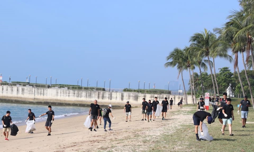 Our frontliners working hard to help clean up the beaches at East Coast Park.