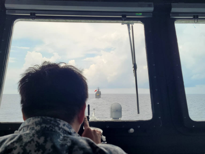 The officer-of-the-watch on RSS Bedok getting the ship into station as part of the manoeuvring exercise with the ships from JMSDF. 