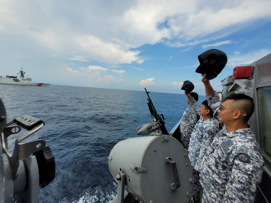 Our sailors lined the deck to bid farewell to our friends at sea. Wishing them "Fair Winds and Following Seas!"