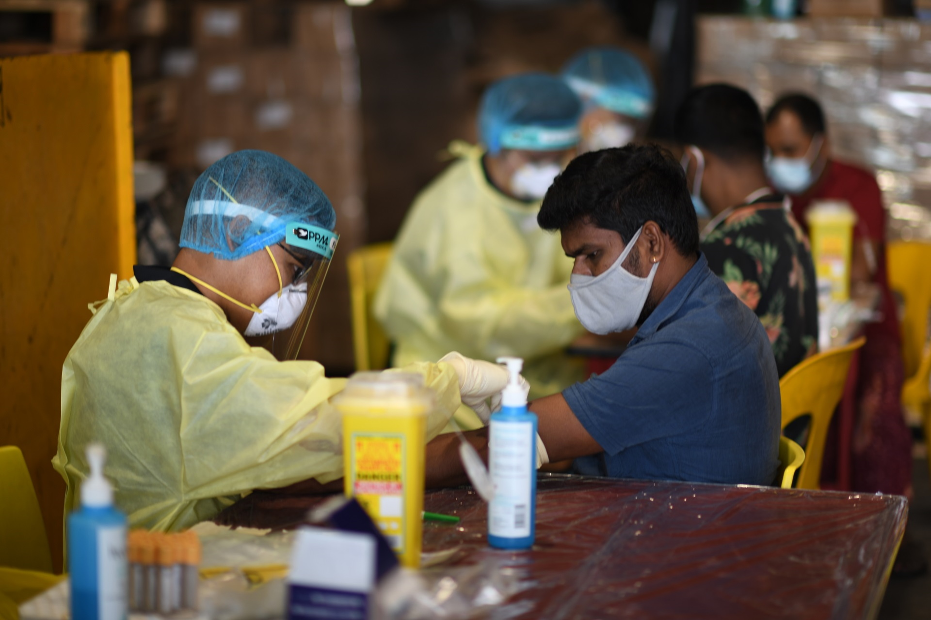 SAF medical personnel carry out serology testing